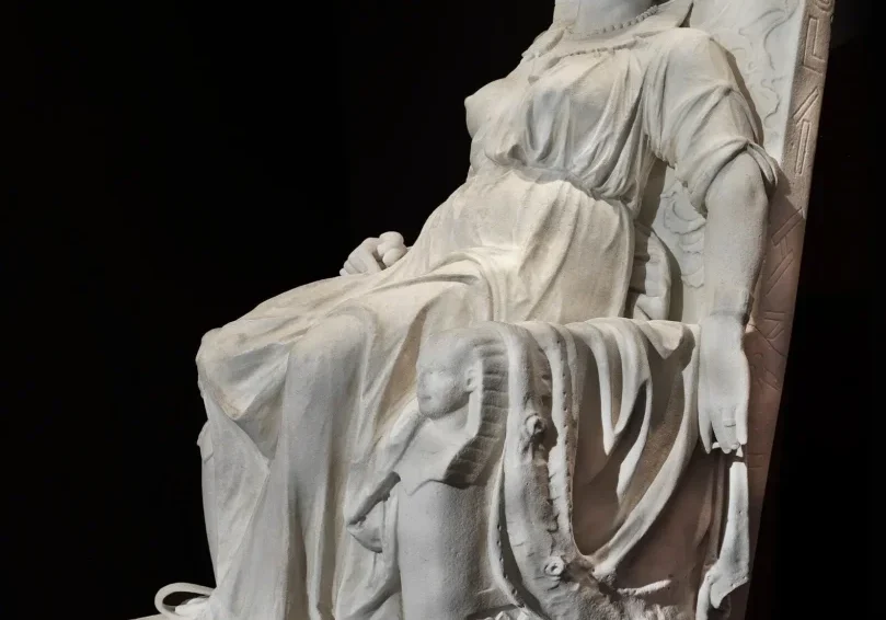 Ancient marble statue of a seated woman